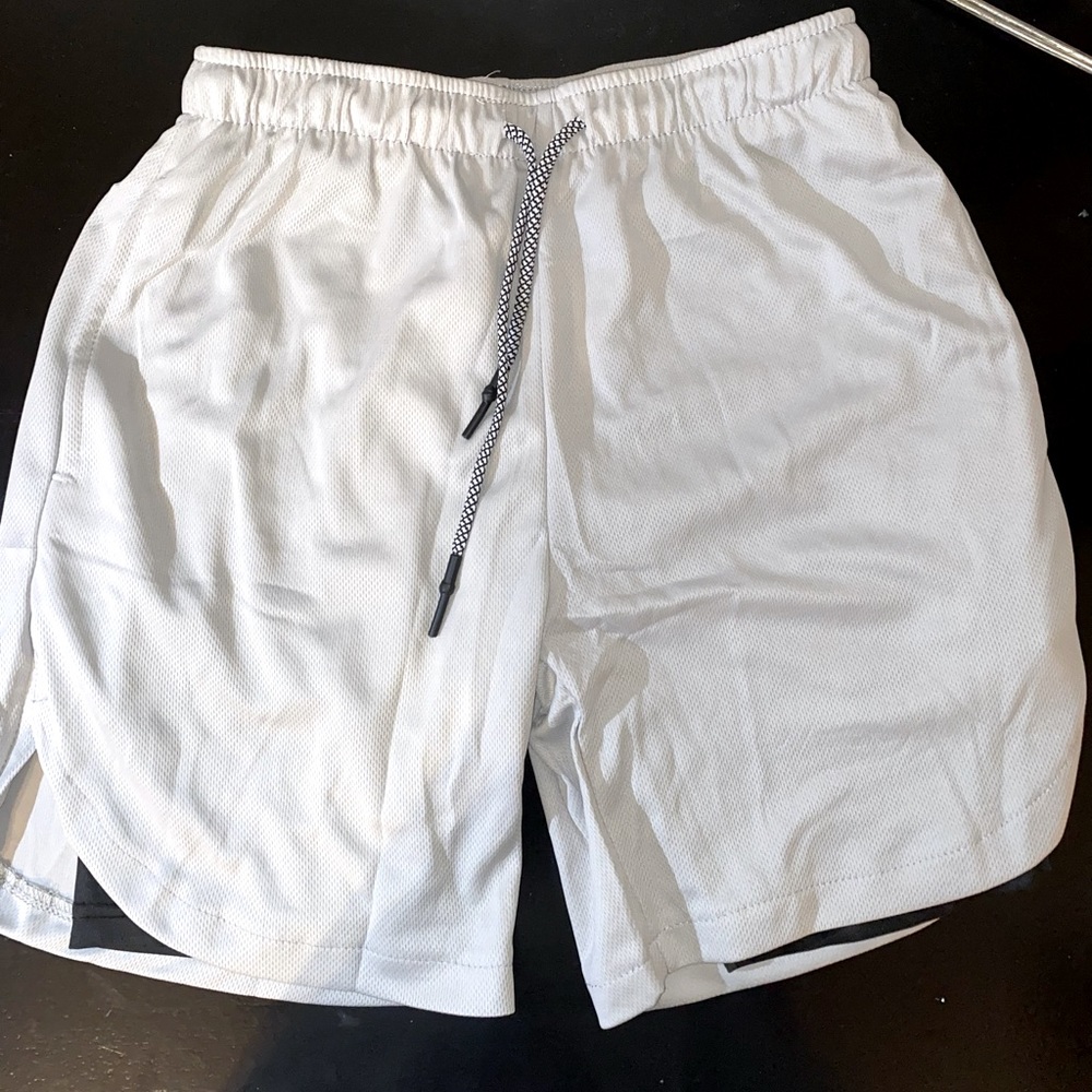 New men’s atheletic shorts. Size Medium in the color light grey